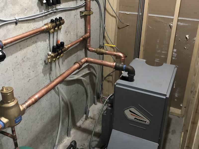 Boiler and zone piping, finished and supported
