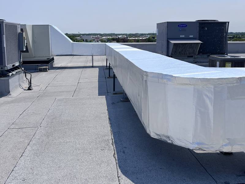 Long rooftop duct run on supports