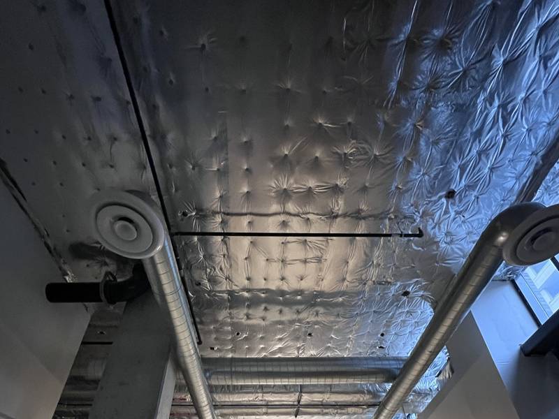 Exposed spiral duct with round diffusers