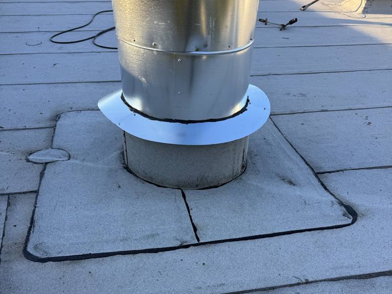 Stack flashing, sealed and finished