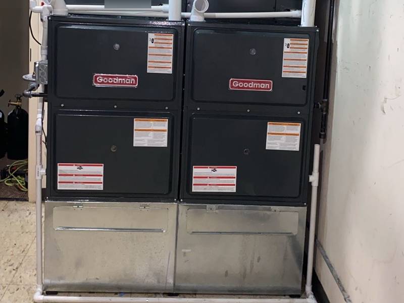 Twin high-efficiency furnaces, installed and piped