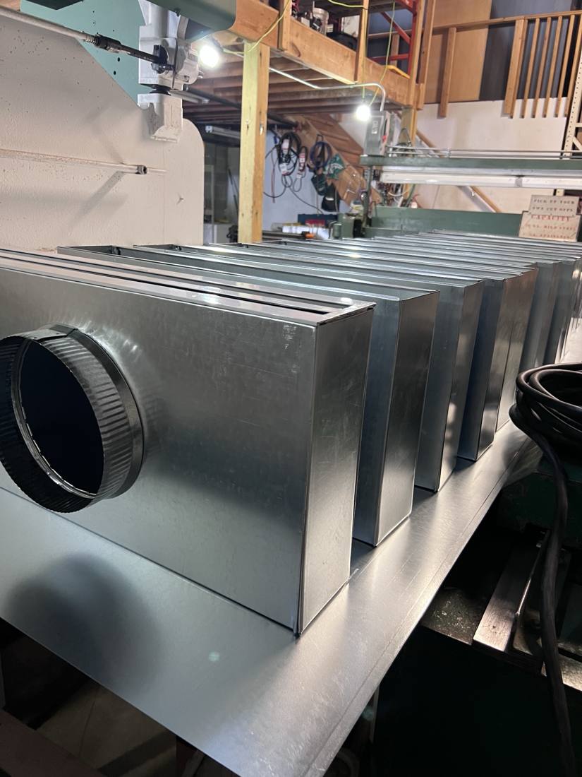 Plenum boxes with round collars, built in our shop