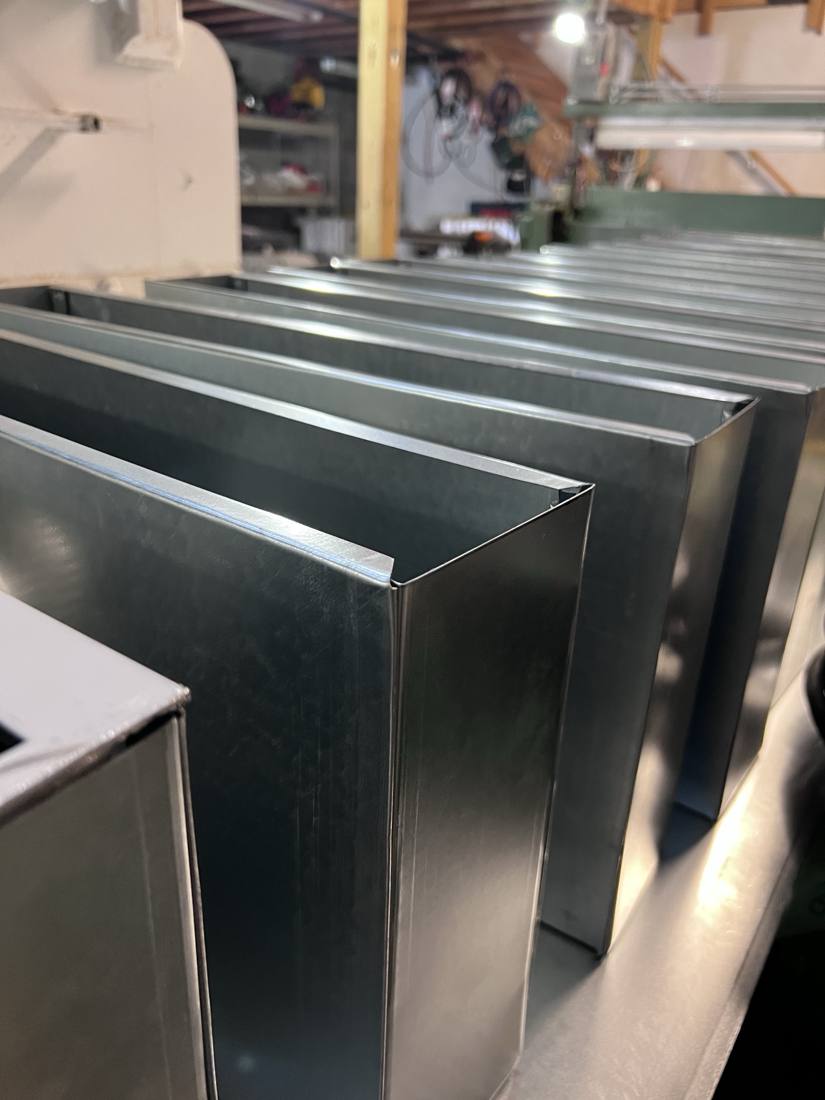Row of plenum boxes ready for the job